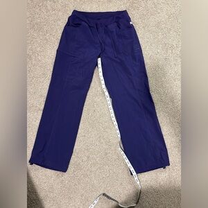 Petite woman’s purple scrub bottoms